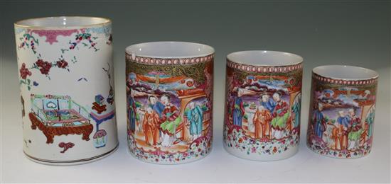 A graduated set of three Chinese export famille rose mugs and another larger, Qianlong period, 10cm-13cm and 16.5cm (4)